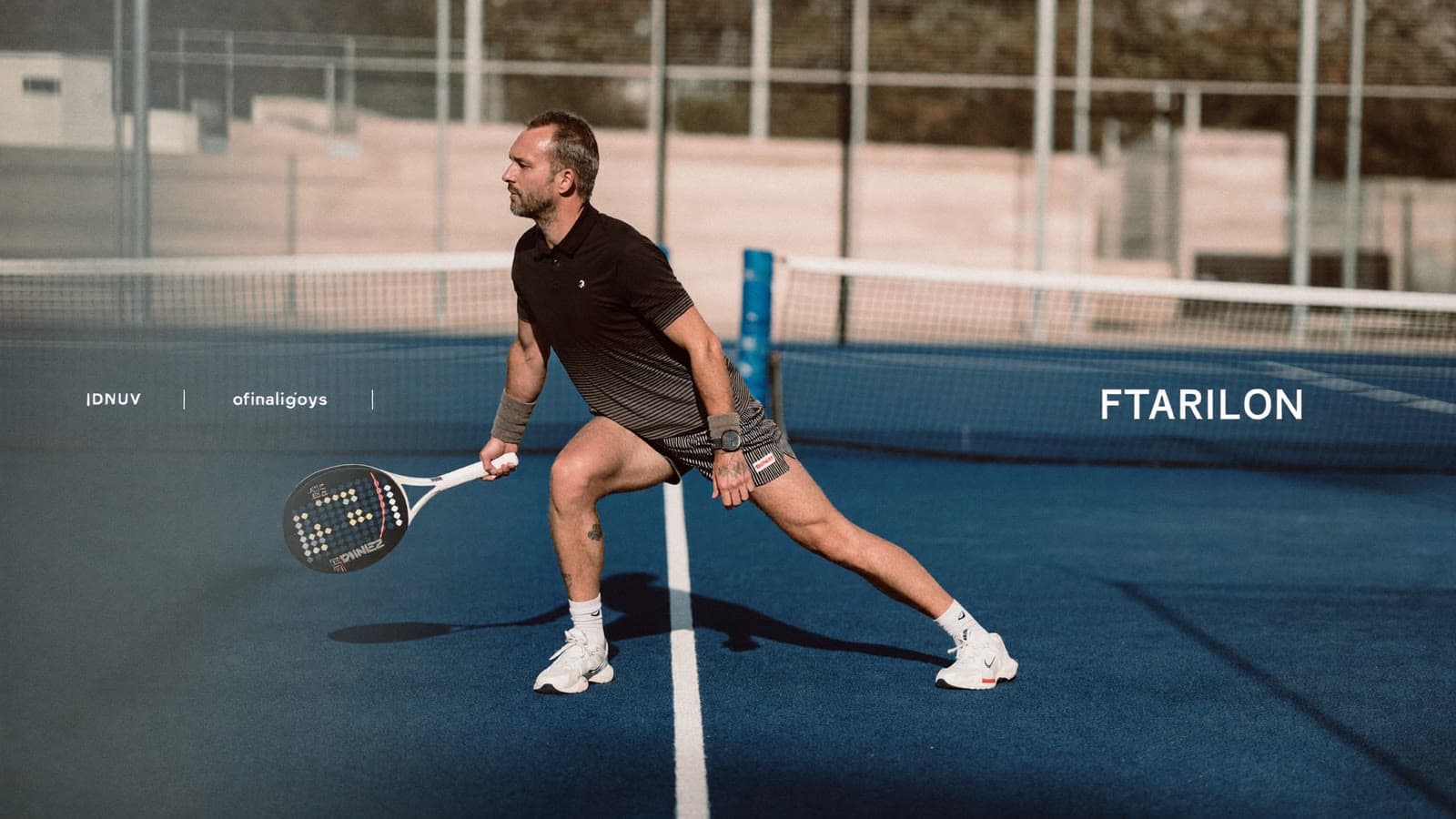 Padel player rotating thoracic spine before a match
